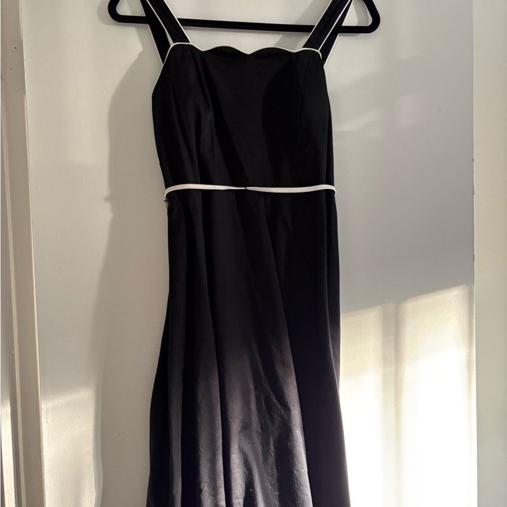 Elegant Black Dress with White Trim
